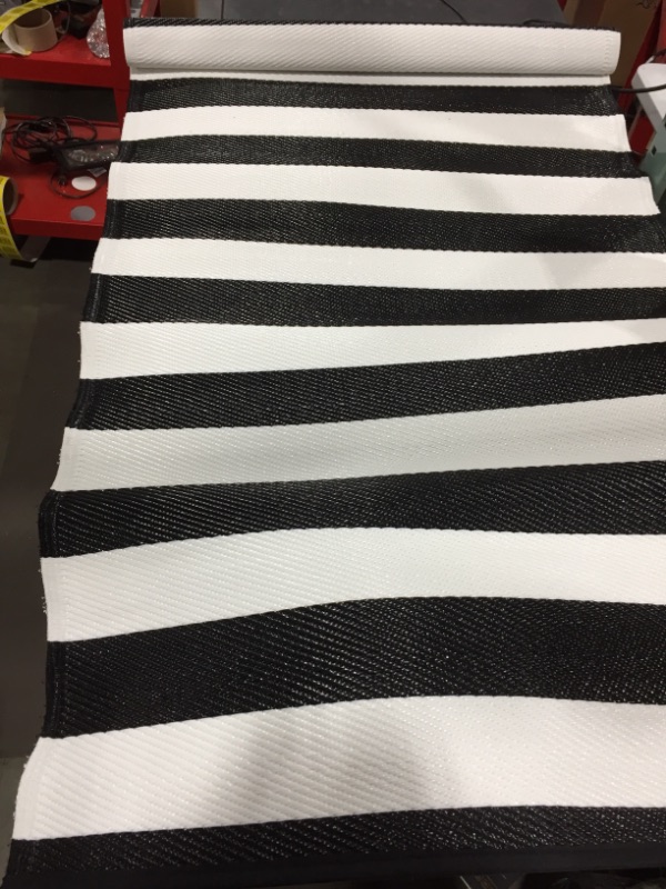 Photo 1 of 6 INCH X 3 INCH 
BLACK AND WHITE RUNNER 