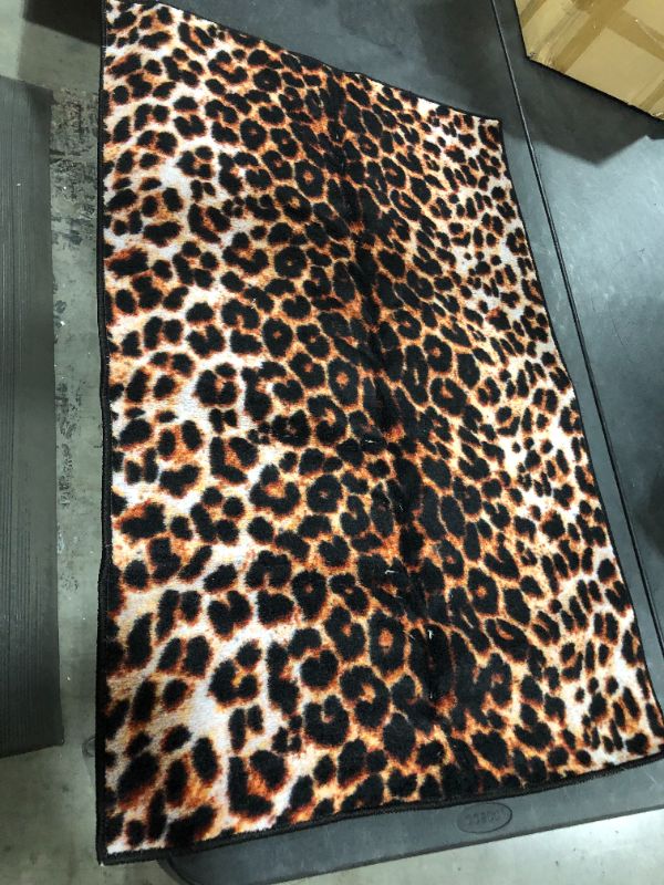 Photo 1 of 29in x 44in mat with leopard print