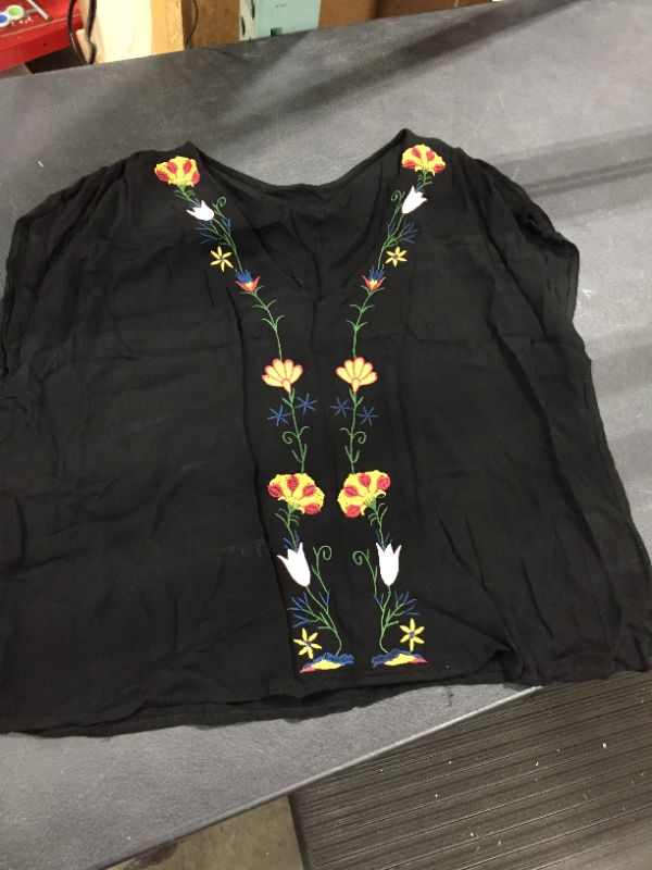 Photo 1 of black shirt with flowers 
size Large