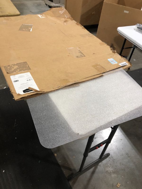 Photo 2 of Amazon Basics Polycarbonate Anti-Slip Hard Floor Chair Mat - 47'' x 30''