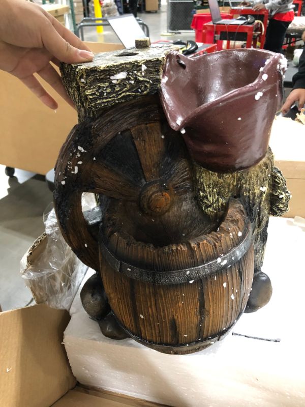 Photo 1 of Alpine Corporation WCT688 Old Fashion Pump Barrel Rustic Fountain, 24 Inch Tall, Brown and Grey
