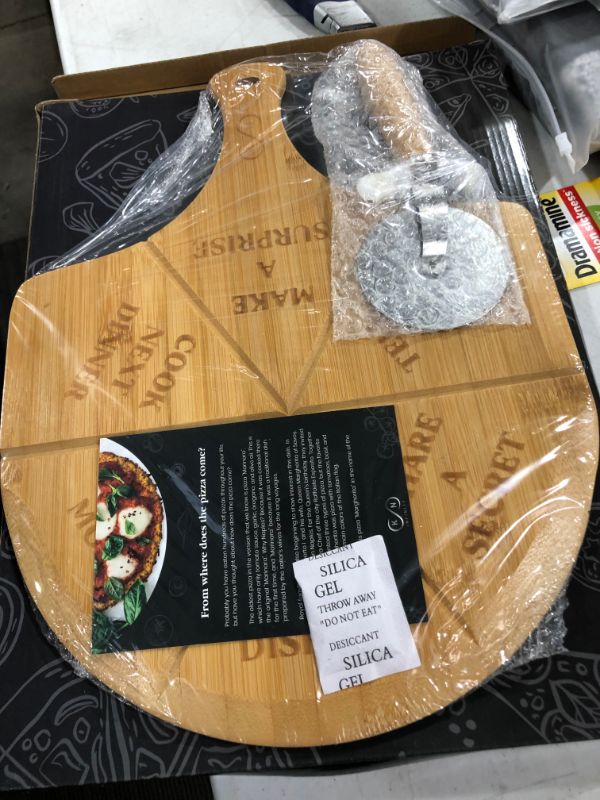 Photo 2 of Bamboo pizza peel, Wood Serving Pan, Cheese and Charcuterie Boards, Pizza Board Pizza Paddle Cutting Board with Handle for Baking Pizza, Bread, Cutting Fruit, Vegetables, Cheese and Serving board
