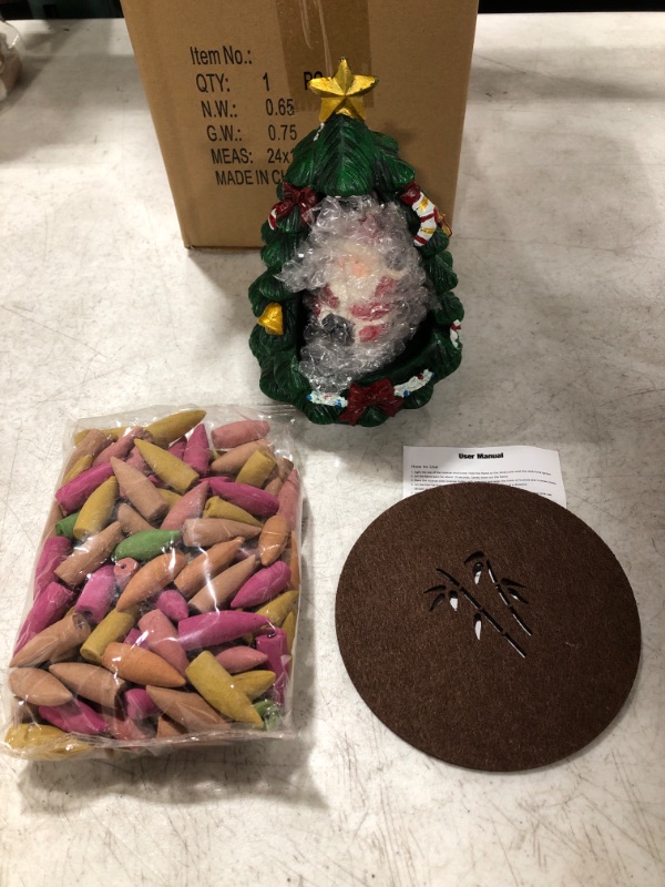 Photo 1 of CHRISTMAS TREE WITH SANTA INCENSE BURNER WITH CONES.