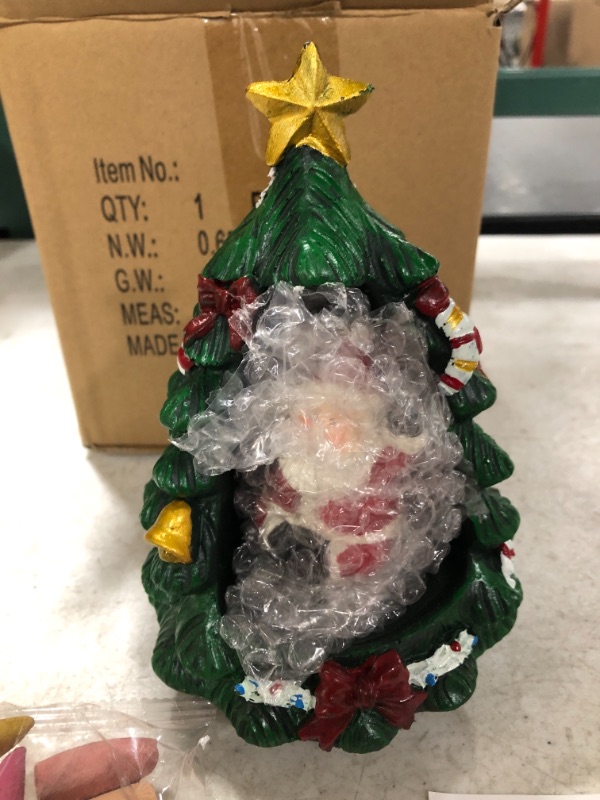 Photo 1 of CHRISTMAS TREE WITH SANTA INCENSE BURNER WITH CONES.