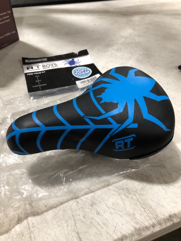 Photo 3 of RUGGED TEC RUGGED BOYS BIKE SEAT, SOFT FOAM PADDING. SPIDE LOGO. 