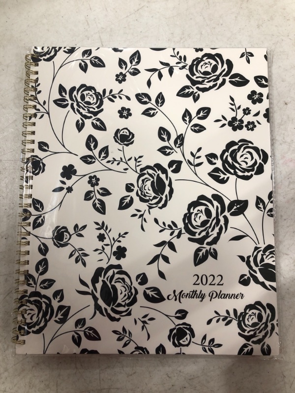 Photo 1 of 2022 MONTHLY PLANNER NOTEBOOK. BLACK/WHITE ROSE PATTERN.