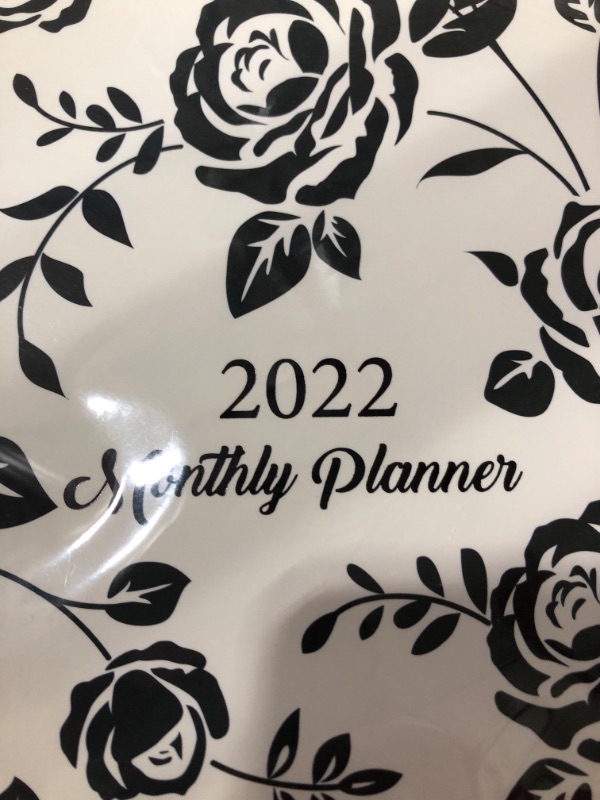 Photo 2 of 2022 MONTHLY PLANNER NOTEBOOK. BLACK/WHITE ROSE PATTERN.