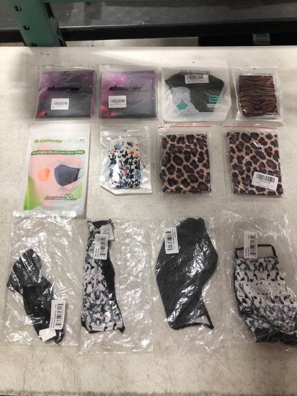 Photo 1 of VARIOUS FACE MASKS AND FACE COVERINGS, LOT OF 12 ITEMS. 