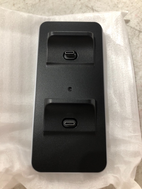 Photo 1 of CHARGING DOCK STATION FOR PS5. 