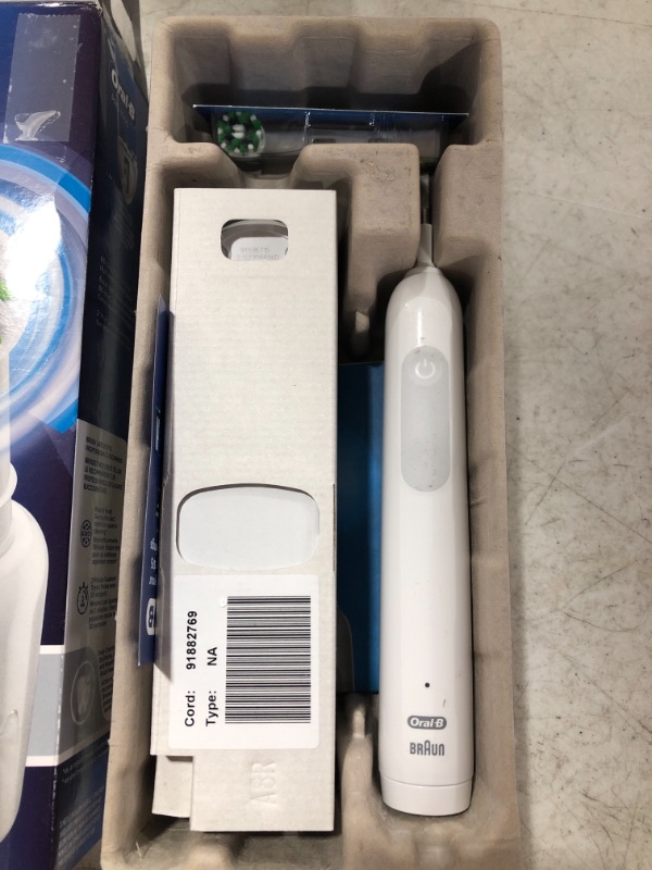 Photo 3 of Oral-B Pro 1000 Power Rechargeable Electric Toothbrush Powered by Braun ,1 count , White (Packaging may vary) OPEN BOX.
