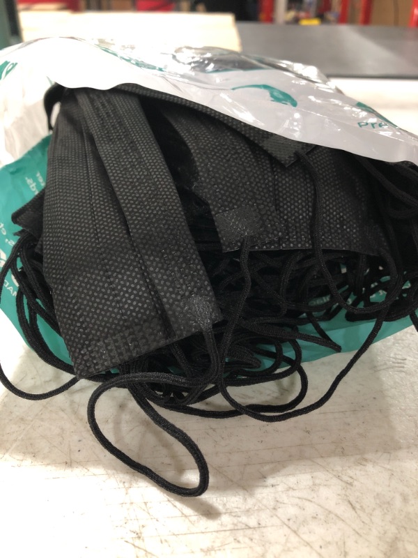 Photo 3 of DISPOSABLE MASK FACE COVERINGS, 100 PIECE BAG. BLACK, ONE SIZE. OPEN BAG.