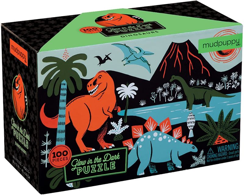 Photo 1 of Mudpuppy Dinosaur Glow-in-the-Dark Puzzle, 100 Pieces, 18”x12” –Perfect for Kids Age 5+ - Colorful and Glowing Illustrations of Dinosaurs and Prehistoric Life - Award-Winning Glow in the Dark Puzzle, Multicolor (9780735345720)
