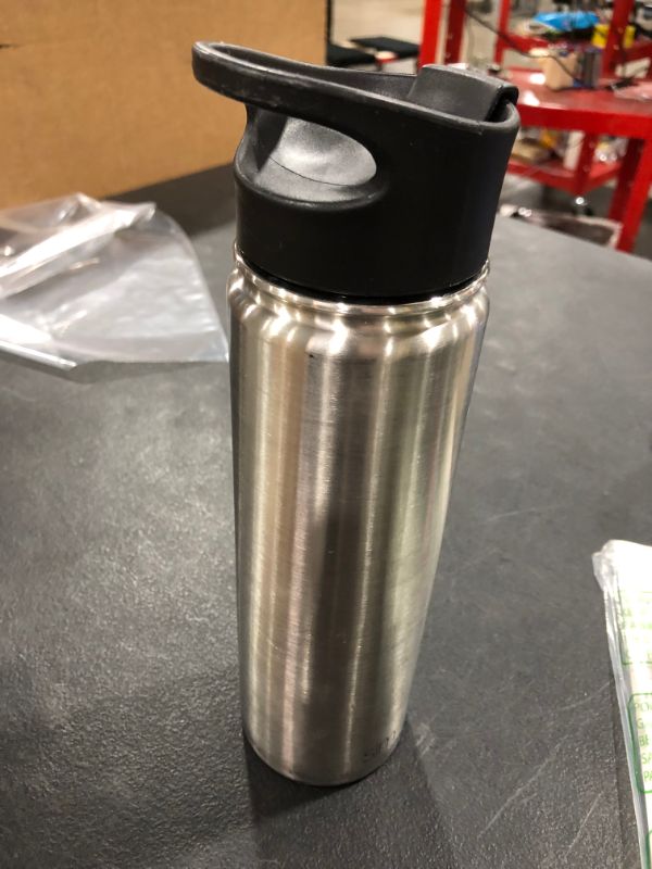 Photo 1 of 22oz silver water bottle with coffee cup styled lid