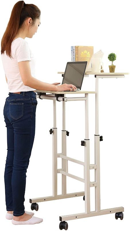 Photo 1 of SDADI 2 Inches Carpet Wheels Mobile Standing Desk Stand Up Desk Height Adjustable Home Office Desk with Standing and Seating 2 Modes 3.0 Edition, Light Grain S001WFLT
