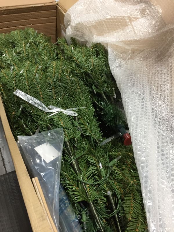 Photo 1 of National Tree Company Pre-Lit Artificial Full Christmas Tree, Green, Dunhill Fir, Dual Color LED Lights, Includes Stand, 7.5 Feet
