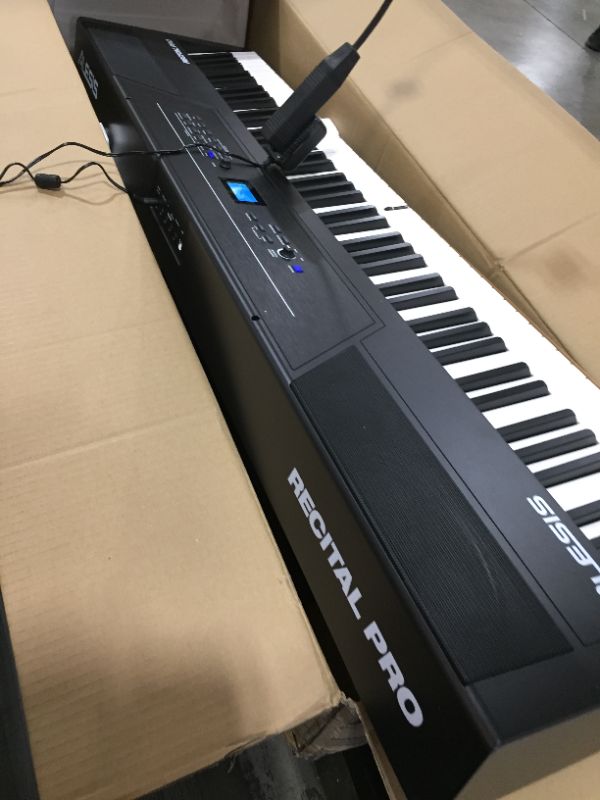 Photo 2 of Alesis Recital Pro - 88 Key Digital Piano Keyboard with Hammer Action Weighted Keys, 2x20W Speakers, 12 Voices, Record and Lesson Mode, FX and Display