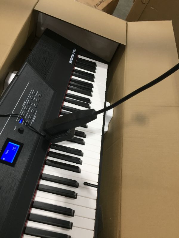 Photo 4 of Alesis Recital Pro - 88 Key Digital Piano Keyboard with Hammer Action Weighted Keys, 2x20W Speakers, 12 Voices, Record and Lesson Mode, FX and Display