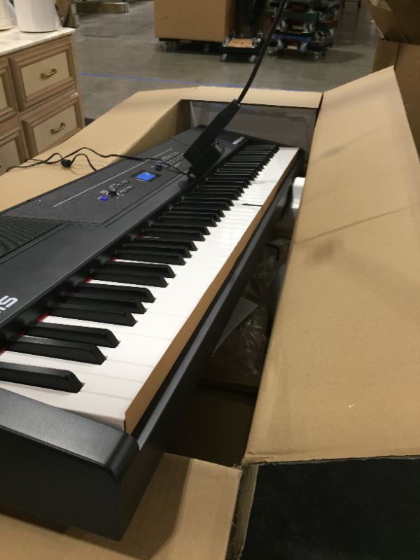 Photo 3 of Alesis Recital Pro - 88 Key Digital Piano Keyboard with Hammer Action Weighted Keys, 2x20W Speakers, 12 Voices, Record and Lesson Mode, FX and Display