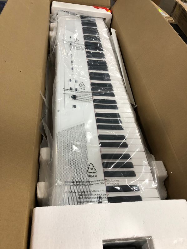 Photo 2 of Alesis Recital White | All White 88-Key Digital Piano / Keyboard with Full-Size Semi-Weighted Keys, Power Supply, Built-in Speakers and 5 Premium