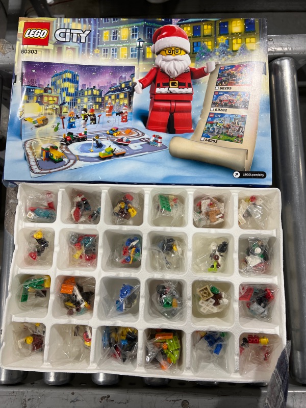 Photo 2 of LEGO City Advent Calendar 60303 Building Kit; Includes City Play Mat; Best Christmas Toys for Kids; New 2021 