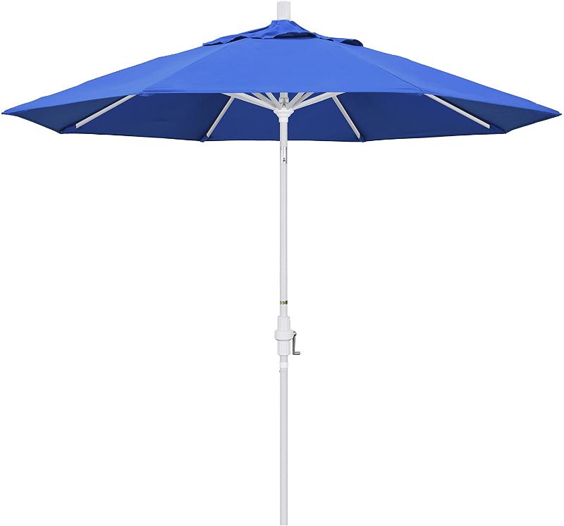 Photo 1 of California Umbrella 9' Round Aluminum Market Umbrella, Crank Lift, Collar Tilt, White Pole, Royal Blue Olefin
