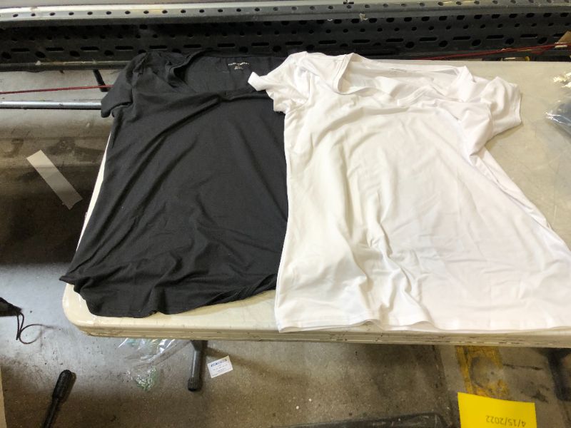 Photo 1 of 2 m size shirts 