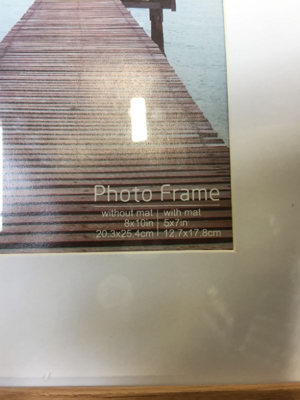 Photo 2 of WOODEN PICTURE FRAME. 8X10 INCH.