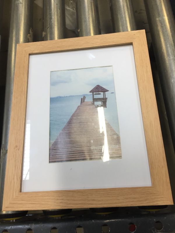 Photo 1 of WOODEN PICTURE FRAME. 8X10 INCH.