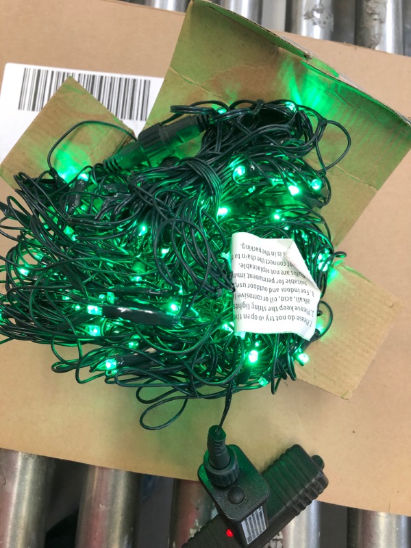 Photo 2 of LED Net Lights Mesh Lights Green St. Patrick's Day Decor, Tree Warp Fairy Lights Outdoor Hanging String Light for Christmas, Halloween, Garden, Walkway, Bushes Decor