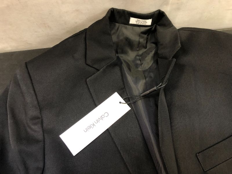 Photo 5 of Calvin Klein Boys 1-Piece Formal Suit Set, Includes Single Breasted Jacket   Black, 14 Husky
