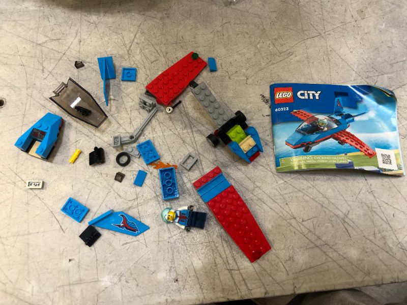 Photo 1 of LEGO City Stunt Plane 60323 Building Kit; Toy Jet with Decorated Tail Fins and an Opening Cockpit, Plus a Pilot Minifigure with a Helmet; Fun Action Toy, Designed for Kids Aged 5 and up (59 Pieces)