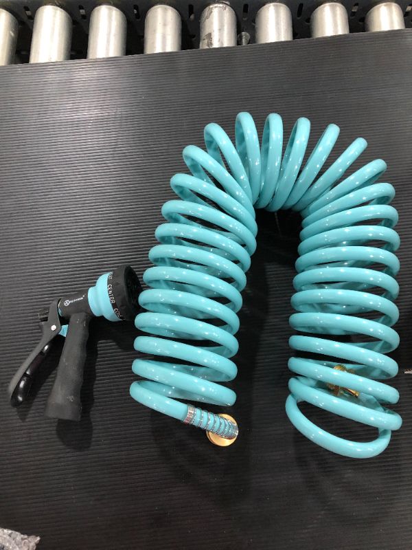 Photo 1 of AUTOMAN EVA Recoil Garden Hose 25ft - Includes 7 Pattern Spray Nozzle,Curly Water Hose 25 Foot,Watering Hose Coil,Retractable,Corrosion Resistant Garden Coil Hose.