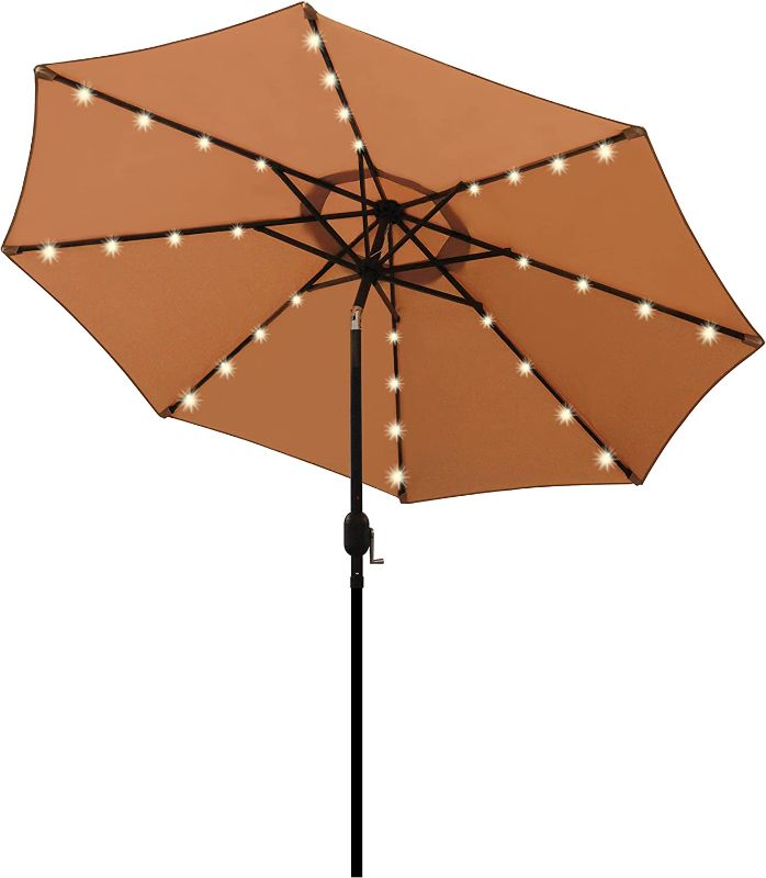 Photo 1 of Blissun 9 ft Solar Umbrella, 32 LED Lighted Patio Umbrella, Table Market Umbrella, Outdoor Umbrella for Garden, Deck, Backyard, Pool and Beach (Tan)