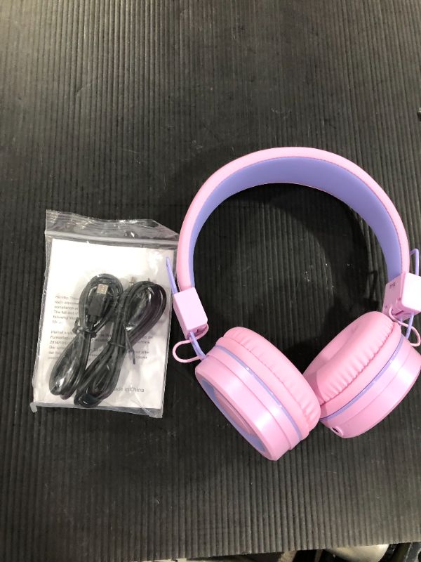 Photo 2 of iClever BTH02 Kids Headphones, Kids Wireless Headphones with MIC, 22H Playtime, Bluetooth 5.0 & Stereo Sound, Foldable, Adjustable Headband, Childrens Headphones for iPad Tablet Home School, Pink