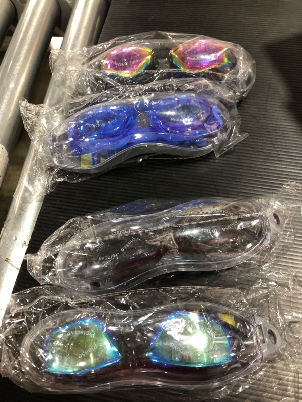 Photo 2 of 4 Pack Swim Goggles Swimming Goggles No Leaking Full Protection Glasses for Men Women Youth UV Protection Fog Proof Swim Goggles with Nose Clips Ear Plugs Storage Boxes
