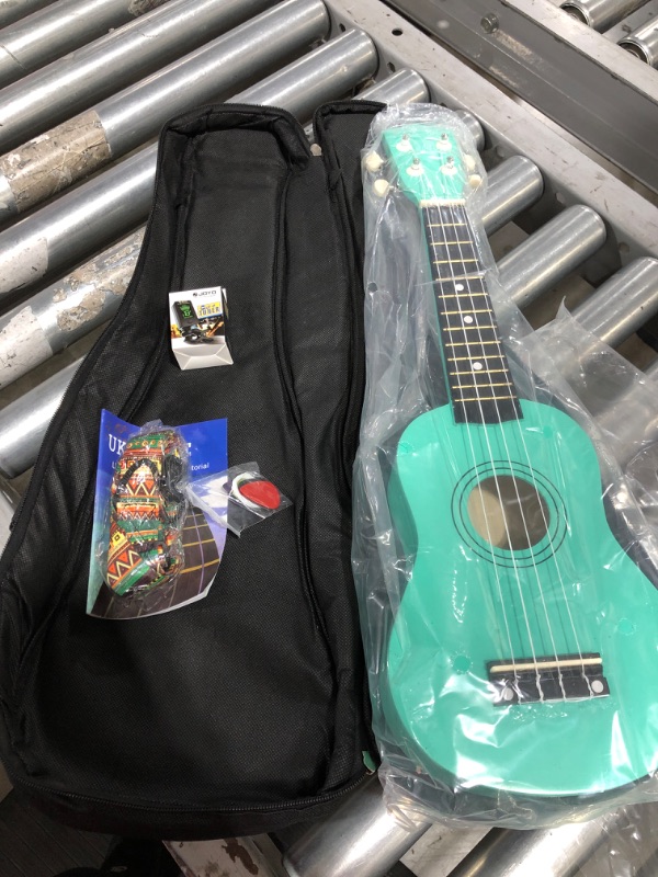 Photo 3 of Amdini 21 inch Soprano Ukulele Basswood Acoustic Mini Guitar for Beginner Starter with Case Strap Tuner Picks Strings Primary Tutorial
