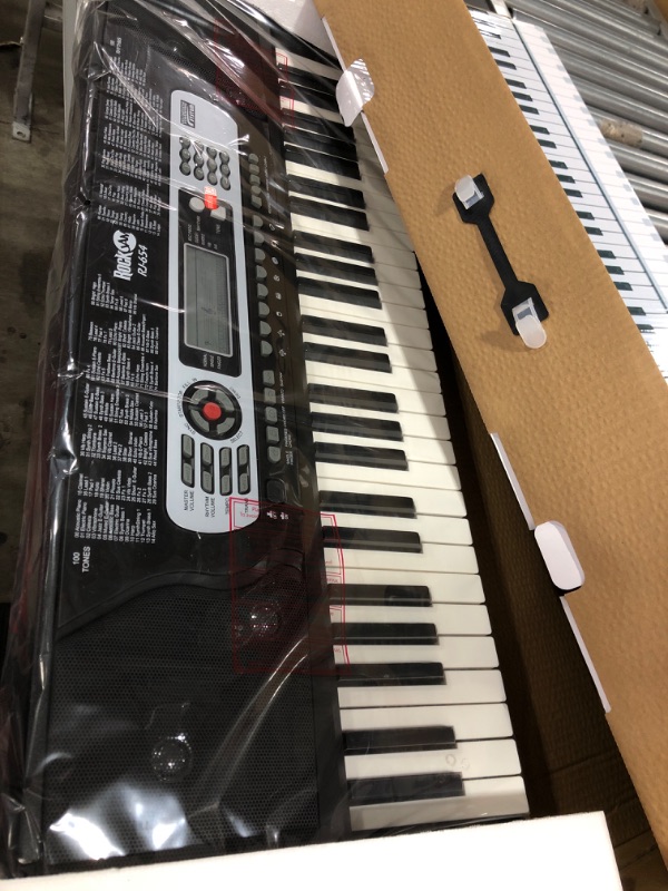Photo 2 of RockJam 54 Key Keyboard Piano with Power Supply, Sheet Music Stand, Piano Note Stickers & Simply Piano Lessons
