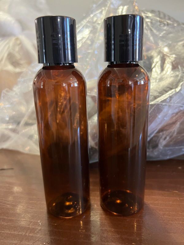 Photo 1 of 4 oz amber plastic lotion bottles (30 pack)