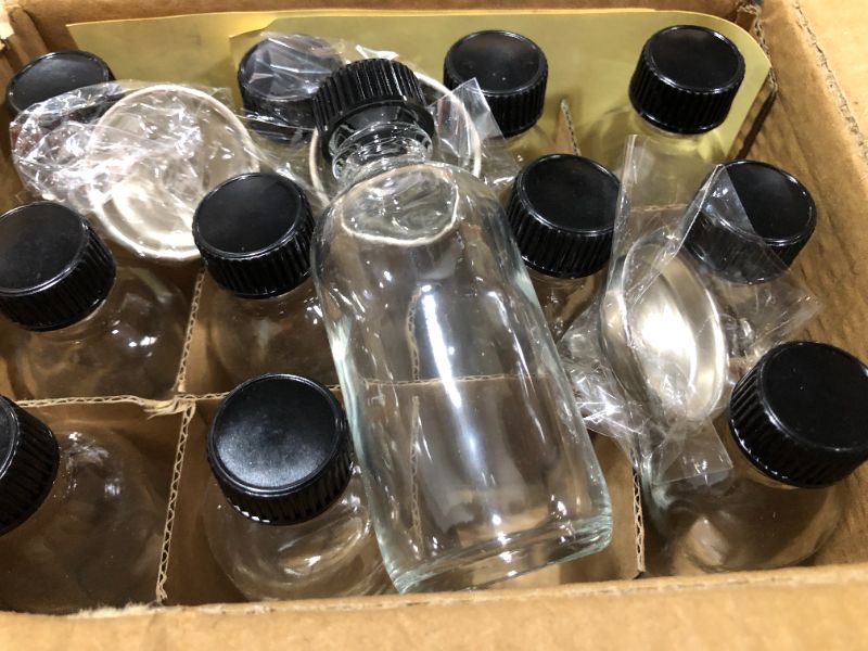 Photo 3 of 12, 2 oz Small Clear Glass Bottles (60ml) with Lids & 3 Stainless Steel Funnels - Boston Round Sample Bottles for Potion, Juice, Ginger Shots, Oils, Whiskey, Liquids - Mini Travel Bottles, NO Leakage

