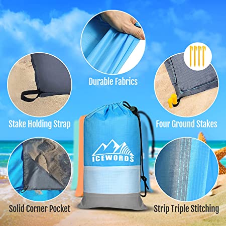 Photo 1 of Beach Blanket Sandproof Waterproof Beach Blanket Quick Drying Large Beach Mat Lightweight Portable Pocket Blanket Oversize Picnic Blanket for 2-6 Adults with 4 Stakes for Beach, Grass, Camping
