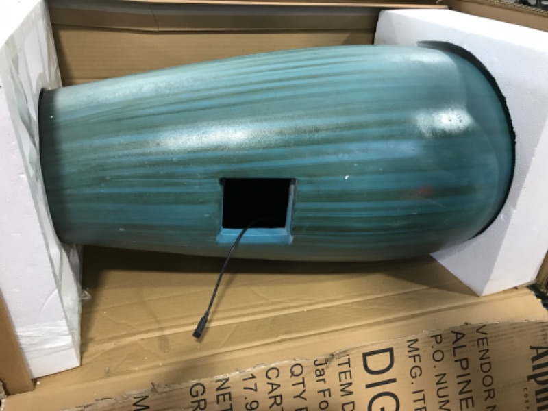 Photo 1 of Alpine Corporation 33" Tall Water Jar Fountain with LED Light, Turquoise
Hose is not connected... light works but the water hose is disconnected