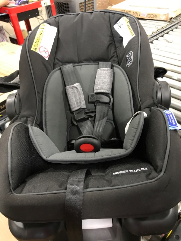 Photo 4 of Evenflo Pivot Modular Travel System with Stroller & ProSeries LiteMax Infant Car Seat - Aspen Skies ***MISSING WHEELS**