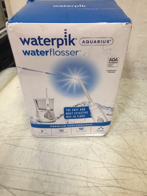 Photo 2 of  
Waterpik Cordless Pearl Rechargeable Portable Water Flosser for Teeth, Gums, Braces Care and Travel with 4 Flossing Tips, ADA Accepted, WF-13 White
