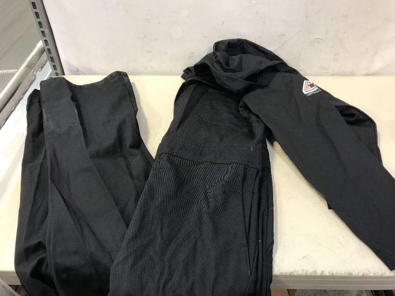 Photo 1 of men's jumpsuit size 38 dirt and odor on item from prior use