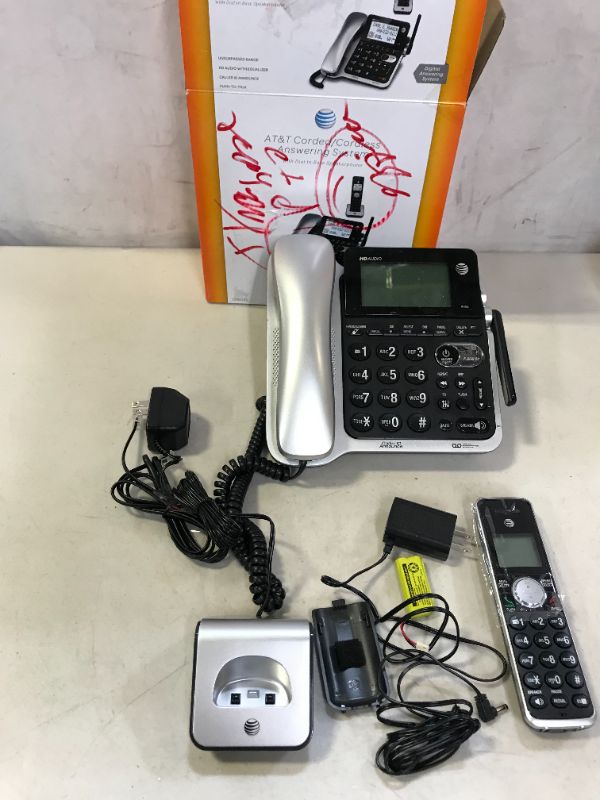 Photo 1 of AT&T CL84102 DECT 6.0 Expandable Corded/Cordless Phone with Answering System and Caller ID/Call Waiting, 1 Corded and 1 Cordless Handset,Silver and Black MINOR DAMAGE TO BOX
