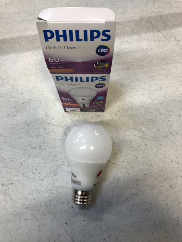 Photo 2 of A19 E26 (Medium) LED Dusk to Dawn Bulb White 60 Watt Equivalence