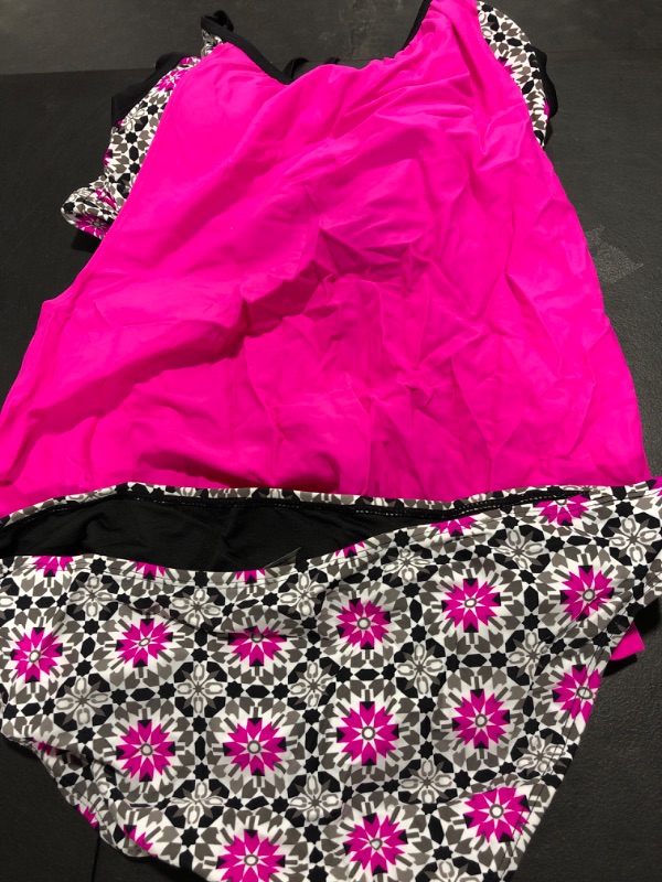 Photo 1 of 2 piece swim suit size Lrg pink/cheetah 