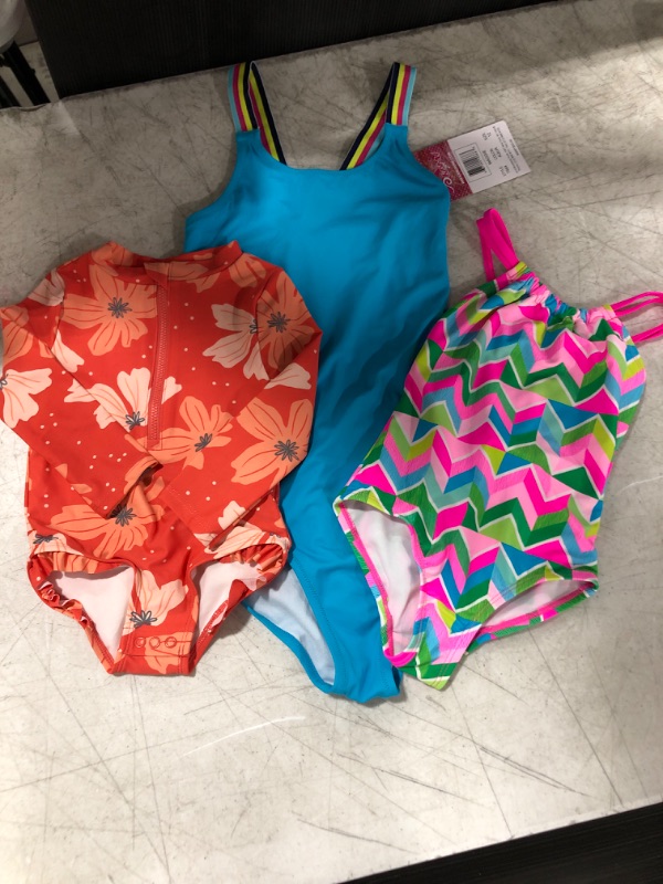 Photo 1 of CHILDRENS SWIMSUIT BUNDLE VARIOUS SIZES (SIZES 12, 4 & 18 MOS)