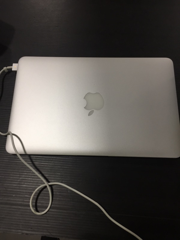 Photo 2 of Apple MacBook Air MD711LL/A 11.6-inch Laptop - Intel Core i5 1.3GHz - 4GB RAM - 128GB SSD 
