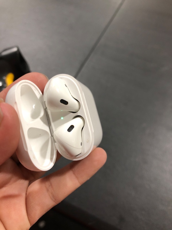 Photo 2 of Apple AirPods (2nd Generation) Wireless Earbuds with Lightning Charging Case Included. Over 24 Hours of Battery Life, Effortless Setup. Bluetooth Headphones for iPhone
